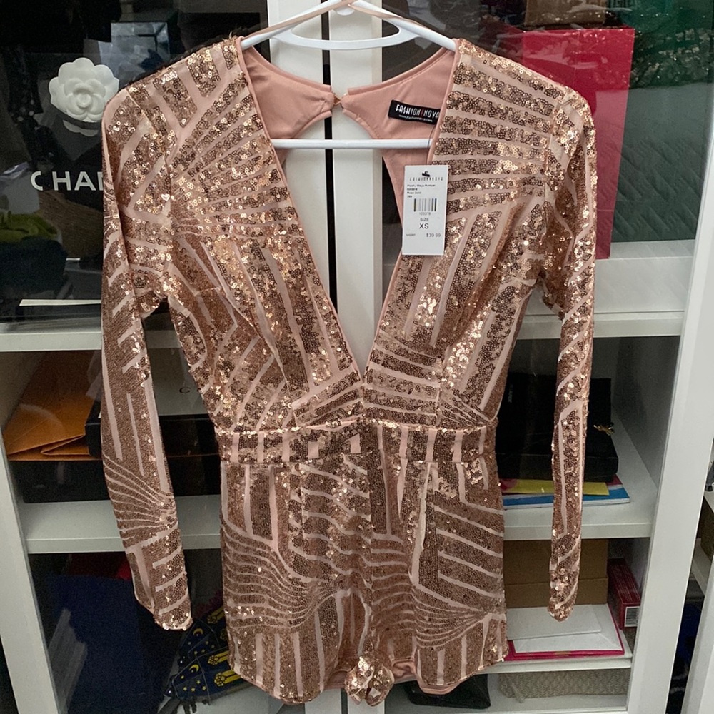 Sequin romper in rose gold. Size XS